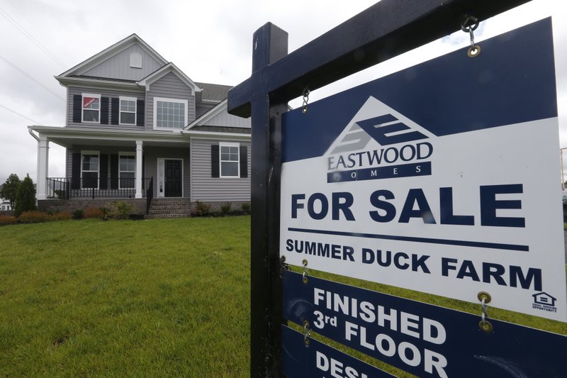 FILE - This June 13, 2019, file photo shows a new home is for sale in Mechanicsville, Va. On Thursday, March 12, 2020, U.S. long-term mortgage rates were mixed this week after hitting all-time lows last week amid anxiety over risks to the economy from the deepening coronavirus crisis.  (AP Photo/Steve Helber, File)