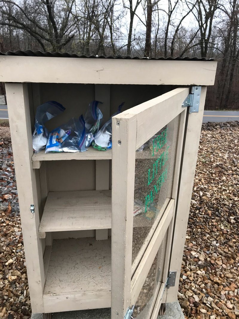The Little Free Pantry at the United Lutheran Church of Bella Vista, 100 Cooper Road, is one of the places donors can drop off non-perishable food items for people in need during the covid-19 crisis. The church stocks the pantry three times a week and welcomes all other donations. Information: 855-1325, unitedlutheranbv.org. (NWA Democrat-Gazette/Becca Martin-Brown)