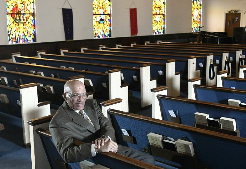 The Rev. Alvin Gwynn Sr. bucked the cancellation trend last weekend by holding services at Friendship Baptist Church in Baltimore. But attendance was down by about 50%.
(AP/Steve Ruark)