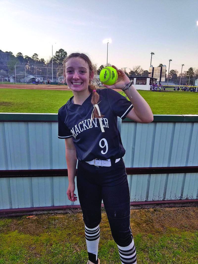 Smackover's Karli Goocher shows off a home run ball she hit earlier this season. The senior, who has signed to play at Lindenwood University, hopes people will put the time away from the field to good use during the dead period.