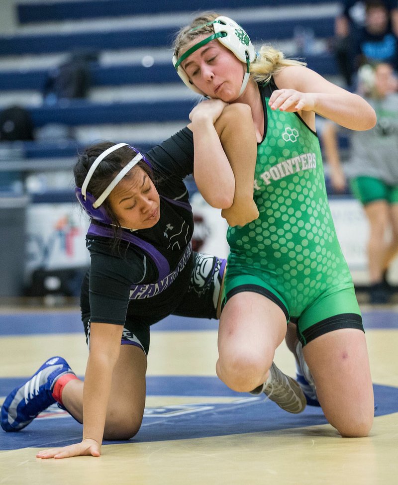 Van Buren's Addison Loney (right) claimed the first Arkansas Activies Association-sanction Arkansas Girls High School Wrestling state title at 140 pounds this season. She has been chosen as the All-NWADG Female Wrestler of the Year for her accomplishments. (NWA Democrat Gazette-Ben Goff)