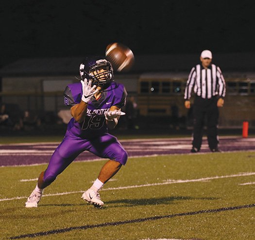 Siandhara Bonnet/News-Times El Dorado's Devunte Kidd gets ready to receive a punt during a game against Benton in the 2019 season. Also a standout in track, Kidd is the two-time defending state champion in the long jump, but he may not get the chance for a three-peat with competition halted due to concerns over the coronavirus.