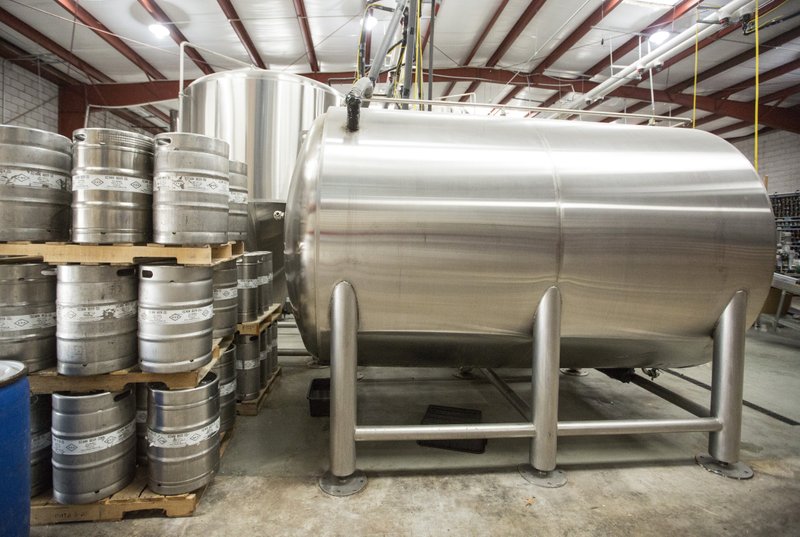 A new 80 barrel lager tank at Ozark Beer Company in downtown Rogers on Wednesday, March 4, 2020. The company laid off all 15 of its employees on Tuesday. 
(NWA Democrat-Gazette file photo/Ben Goff)