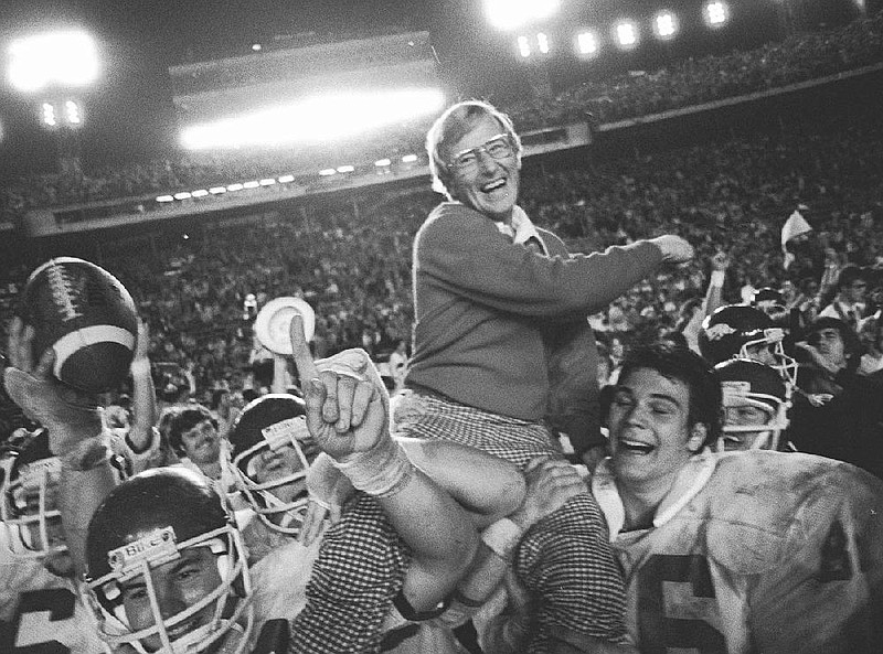 Arkansas coach Lou Holtz is carried off the field after the Razorbacks defeated Oklahoma 31-6 on Jan. 2, 1978, at the Orange Bowl in Miami.
(AP file photo)