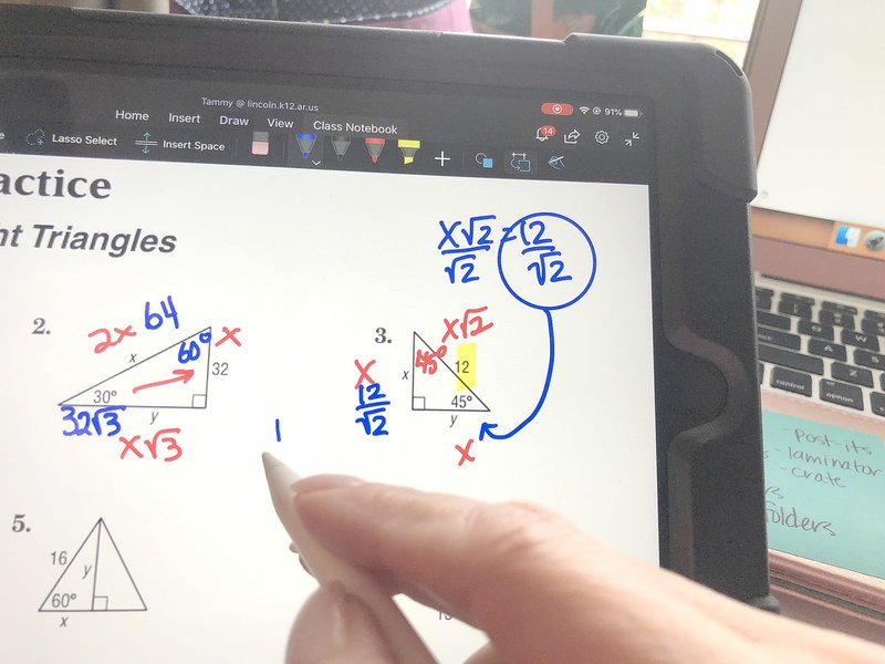 COURTESY PHOTO Tammy Brown, a math teacher at Lincoln High, shows how she uses her iPad like a whiteboard during a Zoom video session with her students. Brown teaches 9th-12th and has been at Lincoln for 15 years. Zoom is a video/audio communication platform and allows Brown to meet with many students at one time.