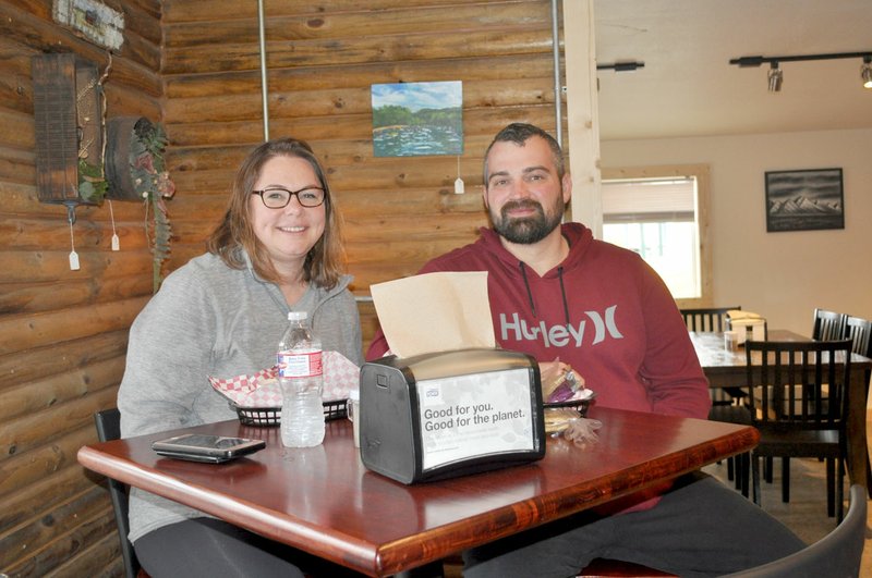 RACHEL DICKERSON/MCDONALD COUNTY PRESS Erin and Justin Farmer enjoy lunch at Mustang Bistro on Friday, March 20, before Gov. Mike Parson ordered Missouri residents to stop dining in at restaurants. Now drive-through, delivery and take-out are the only options, due to the coronavirus pandemic.