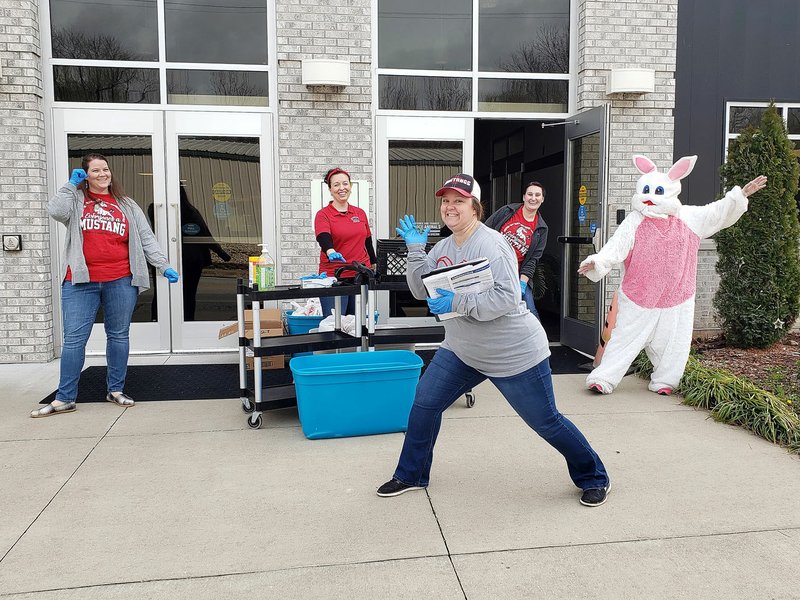 COURTESY PHOTO/In the midst of an unprecedented pandemic and widespread school closings, staff at Pineville Elementary try to keep students' spirits light with fun costumes and friendly smiles.