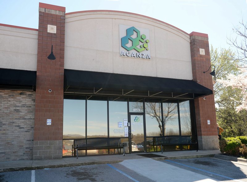 Acanza, a medical marijuana dispensary in Fayetteville, stands Wednesday, March 25, 2020, at 2733 N. McConnell Ave. Medical marijuana dispensaries are reducing operational hours, taking orders online and limiting the number of people inside their locations in an attempt to prevent the spread of covid-19. 
(NWA Democrat-Gazette/Andy Shupe)