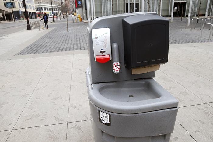 A portable hand-washing unit with sanitizer sits Wednesday at the Nicollet Mall in Minneapolis, part of efforts to slow the coronavirus in that state.
(AP/Jim Mone)
