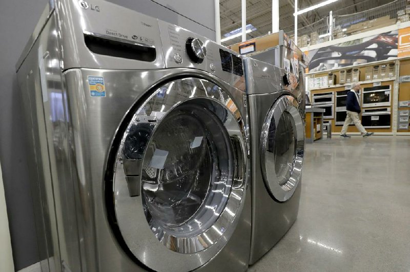 Orders to U.S. factories for big-ticket manufactured goods like this washer and dryer rose in February.
(AP/Steven Senne)
