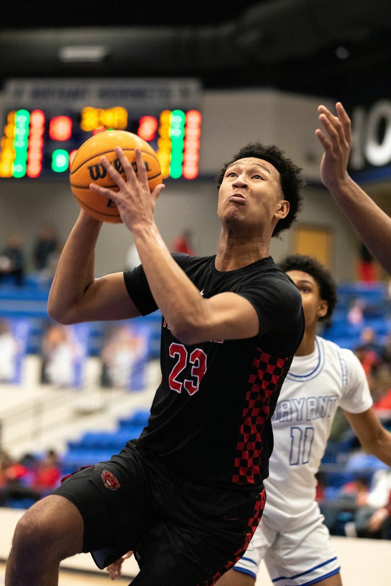 Fort Smith Northside standout Jaylin Williams, an Arkansas commit, led the Grizzlies back to the Class 6A state tournament this season and averaged a double-double. The 6-10 senior has been named the All-NWADG Division I boys basketball Player of the Year for the second consecutive season. (Arkansas Democrat-Gazette/Justin Cunningham)