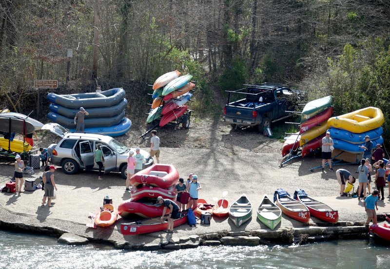 Outfitters and private boaters stage Thursday as they prepare to put on the Buffalo River from the low water bridge in Ponca. Go to nwaonline.com/200329Daily/ and nwadg.com/photos for a photo gallery. (NWA Democrat-Gazette/David Gottschalk)
