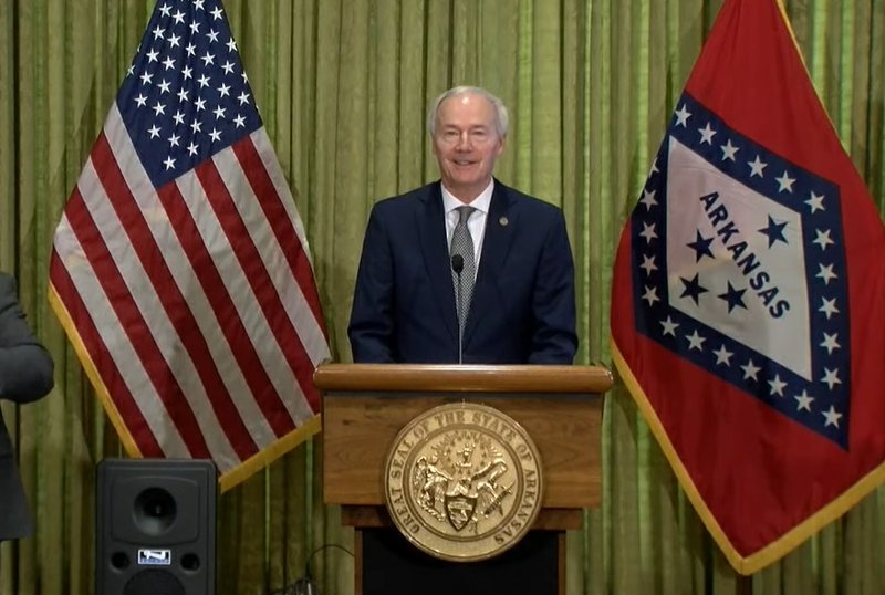 Arkansas Gov. Asa Hutchinson speaks Friday at a news conference at the state Capitol.