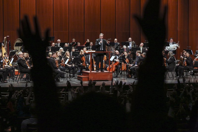 Associate Conductor Geoffrey Robson during the Arkansas Symphony Orchestra's 2019 Children's Concert at the Robinson Center Friday, Feb 8, 2018 in Little Rock. The symphony's board of directors has canceled the remainder of the orchestra’s 2019-20 season citing concern for “the health, safety and well being of the audience, musicians and staff.” (Democrat-Gazette file photo)