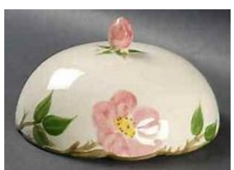 This dome, in the popular Desert Rose pattern from Franciscan Ware, is a rare toast cover from the china collection. It should retail for $150-$175. (TNS/Handout)
