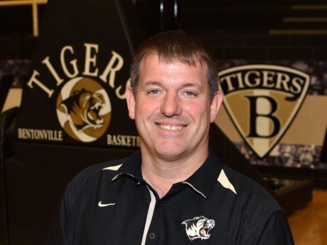 Bentonville coach Tom Halbmaier was named by the Division I girls basketball coach of the year by the NWADG sports staff.