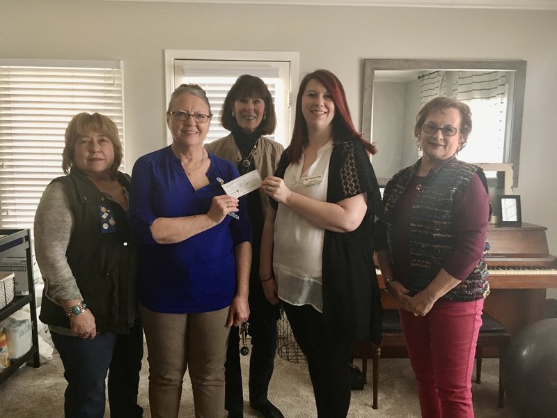 Altrusa of Springdale recently delivered a donation to The Compassion House for teen moms, who were in need of groceries. The money was earned through poinsettia sales. The group also sent a donation to Meals on Wheels in Springdale in March, as many shut-in seniors were in need of food delivery. The next fundraiser event will be spring flower sales in April. Information: Email altrusaspringdalear@gmail.com. (Courtesy Photo/Susan Verser)