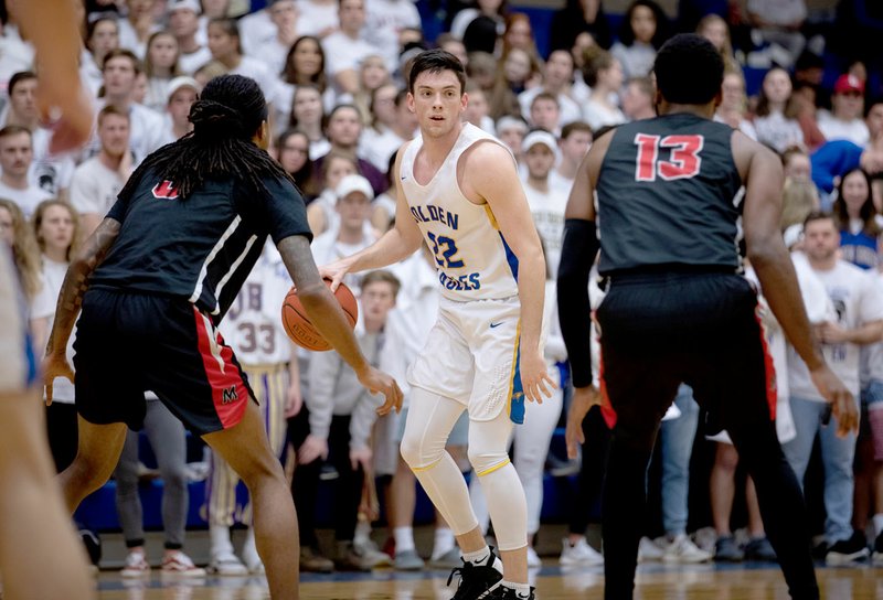 Photo courtesy of JBU Sports Information John Brown sophomore Luke Harper, seen here against Mid-America Christian on Jan. 30, was selected as an NAIA Third-Team All-American, it was announced last week.