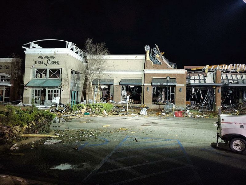 Damage is visible at the front of the Mall at Turtle Creek in Jonesboro on Saturday night after a tornado struck the city. At right is a Barnes and Noble bookstore.
(Arkansas Democrat-Gazette/Joe Flaherty)