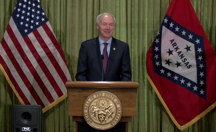 Arkansas Gov. Asa Hutchinson speaks to reporters Monday at the state Capitol in Little Rock in this screen grab of video provided by the governor’s office. 