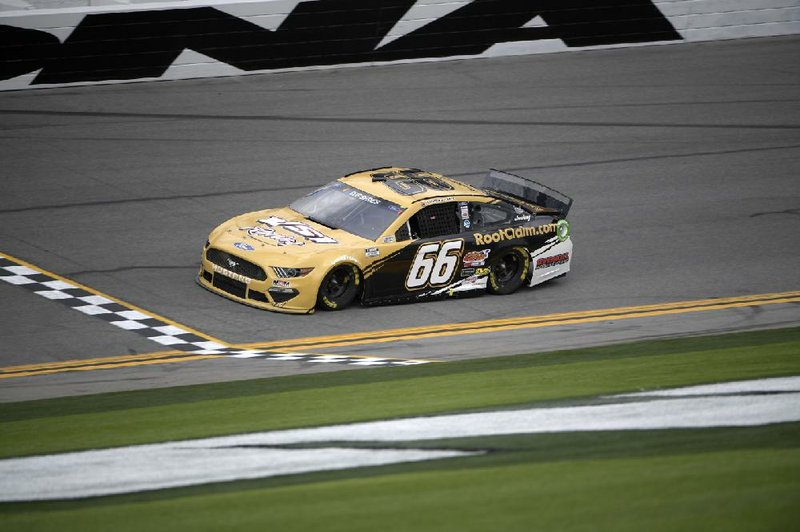 Timmy Hill (66) won a NASCAR virtual racing event Sunday. The second virtual racing event featured 35 NASCAR drivers operating simulators competing in an exact replica event at Texas Motor Speedway, and it was televised by Fox. NASCAR is scheduling the events while the Cup Series is suspended.
(AP/Phelan M. Ebenhack)