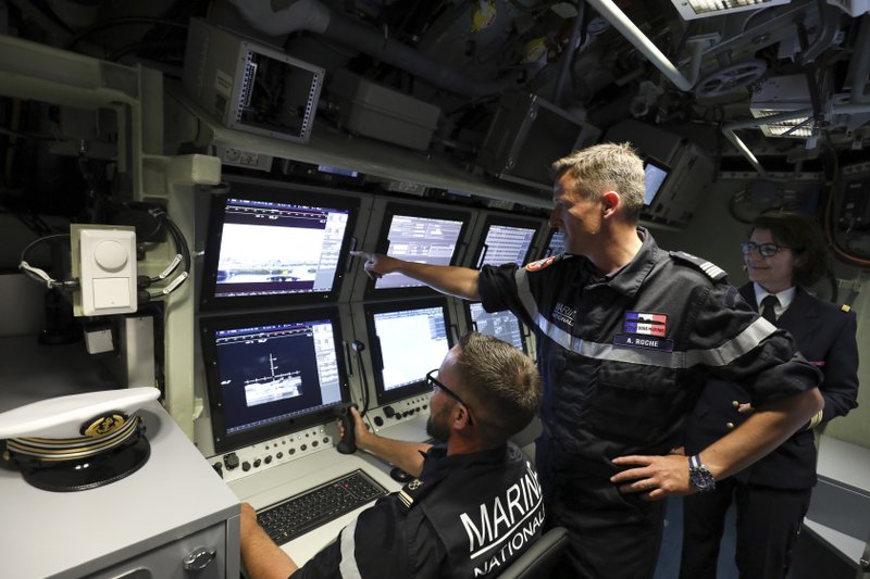 The Associated Press BLISSFULLY UNAWARE: In this July 12, 2019, file photo, French navy commander Axel Roch poses in the navigation and operations center in the new nuclear-powered submarine "Suffren" in Cherbourg, north-western France. Stealthily cruising the ocean deeps, deliberately hiding from the world now in turmoil, the crews of nuclear-armed submarines may be among the last pockets of people anywhere who are still blissfully unaware of how the coronavirus pandemic is turning life upside down. The new coronavirus causes mild or moderate symptoms for most people, but for some, especially older adults and people with existing health problems, it can cause more severe illness or death.