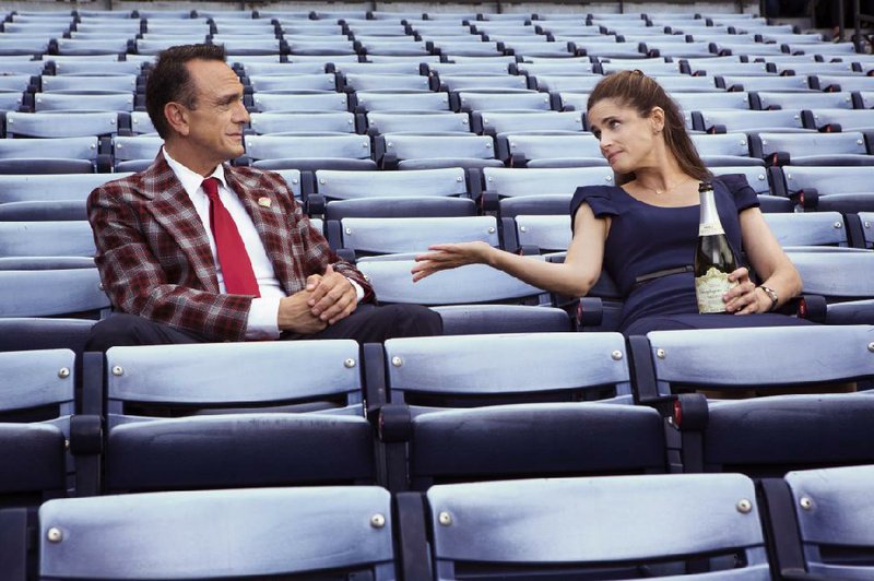 Hank Azaria (left) stars as Jim Brockmire and Amanda Peet as Jules in the IFC series Brockmire. Peet used to suffer from stage fright until she overcame it.
(IFC/Kim Simms)
