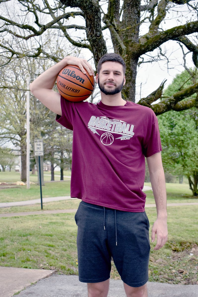MARK HUMPHREY ENTERPRISE-LEADER Former Lincoln star, Shandon "Biggie" Goldman, shown at Lincoln's city park Friday, works out on his own without access to a gym during the covid-19 crisis. Goldman will earn a degree from Northern Iowa in May, then play at Tennessee Tech as a graduate transfer. The 6-foot-10 forward opted to redshirt this past season saving one season of eligibility.