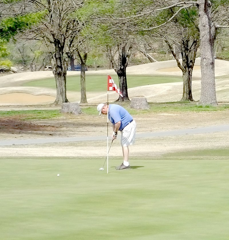 Lynn Atkins/The Weekly Vista When temperatures soared on Thursday, Bella Vista golf courses, one of the few amenities open, had a busy day. Golfers were asked to leave the flags in the hole when putting to cut down on the number of people handling them.