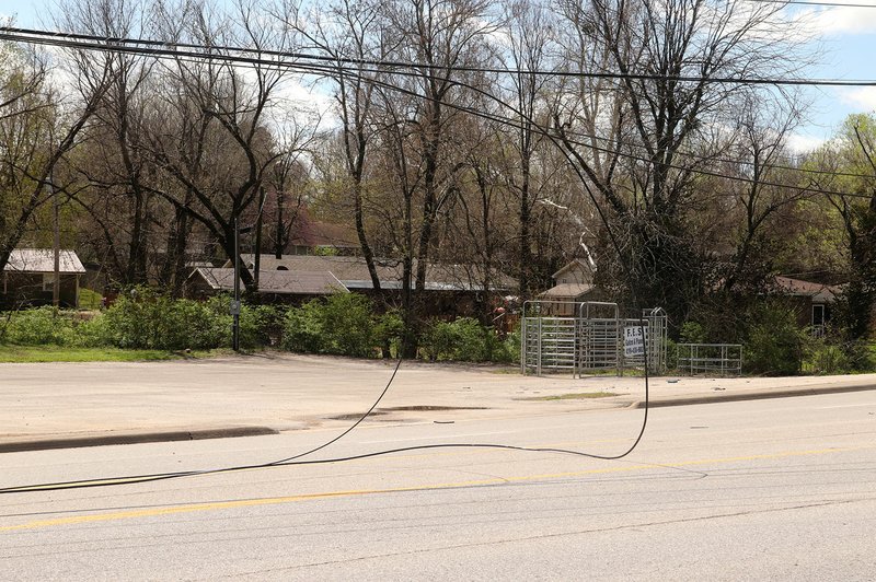 LYNN KUTTER ENTERPRISE-LEADER Traffic was stopped and diverted for about six hours along Main Street in Farmington last week after a semi-truck traveling west on the highway caught overhead utility and communication lines and brought them down to the road.