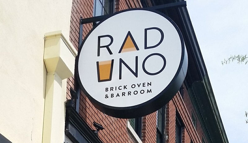 The sign outside Raduno Brick Oven & Barroom