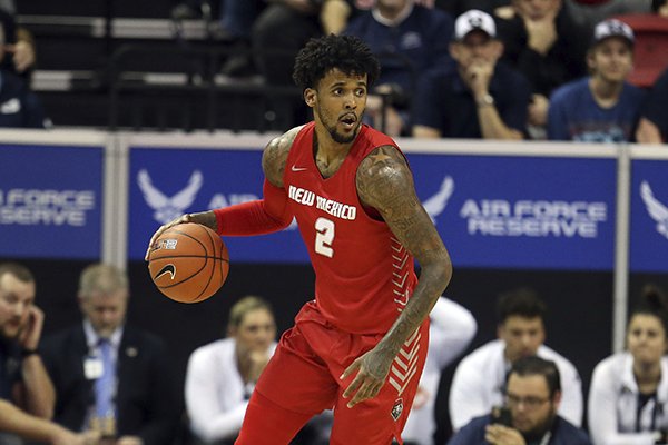 New Mexico's Vance Jackson plays against Utah State during the first half of a Mountain West Conference tournament NCAA college basketball game Thursday, March 5, 2020, in Las Vegas. (AP Photo/Isaac Brekken)

