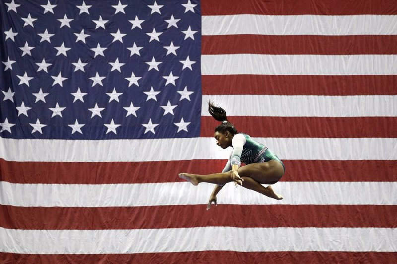 American gymnast Simone Biles said nothing is set in stone on whether she will compete in the Tokyo Olympics that have been postponed to 2021. The most decorated female gymnast ever said she is exploring the right training regiment to get her mentally and physically ready.
(AP file photo)