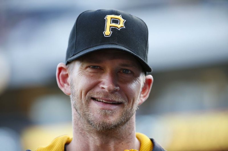 Pittsburgh Pirates starting pitcher A.J. Burnett is interviewed before a baseball game against the Minnesota Twins in Pittsburgh Tuesday, May 19, 2015.(AP Photo/Gene J. Puskar)