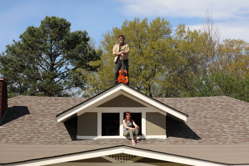 Pine-Bluff native Mark Edgar Stuart hangs out on his roof in Memphis with his wife when times get tough. The singer-songwriter is livestreaming a show Wednesday night on his Facebook page.

(Special to the Democrat-Gazette/Jamie Harmon)