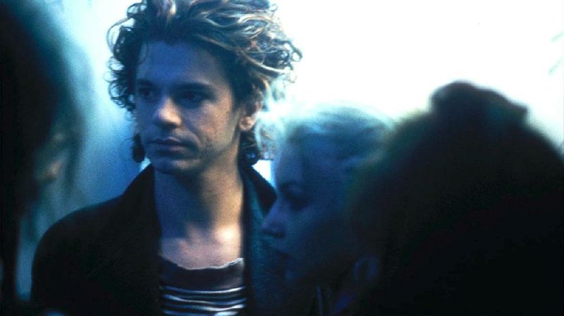 INXS lead singer Michael Hutchence appears in a scene for his longtime collaborator Richard Lowenstein’s documentary Mystify: Michael Hutchence, now available on DVD.
