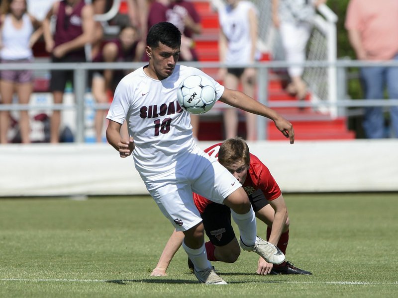 Franklin Cortez of Siloam Springs controls the ball during play in the Class 5A state championship game last season at the University of Arkansas' Razorback Field. Siloam Springs is hopeful for another chance at a title after losing 1-0 to Russellville in last year's championship game. (NWA Democrat-Gazette/Ben Goff)