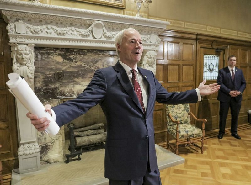 Gov. Asa Hutchinson speaks to reporters after wrapping up the Thursday update on the state’s coronavirus response at the Governor’s Conference Room in the state Capitol.
(Arkansas Democrat-Gazette/John Sykes Jr.)