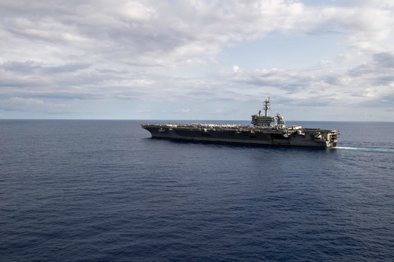 The USS Theodore Roosevelt is underway in the Philippine Sea during late March. 
(U.S. Navy handout photo by Specialist Seaman Jomark A. Almazan)