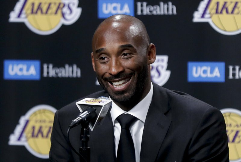 FILE - In this Dc. 18, 2017 file photo, former Los Angeles Laker Kobe Bryant talks during a news conference in Los Angeles. Bryant and fellow NBA greats Tim Duncan and Kevin Garnett headlined a nine-person group announced Saturday, April 4, 2020, as this year’s class of enshrinees into the Naismith Memorial Basketball Hall of Fame.