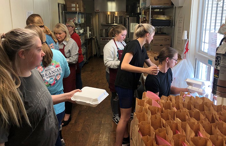 Rotary Interact Club members from Cutter Morning Star High School serve lunch at Jackson House. - Submitted photo