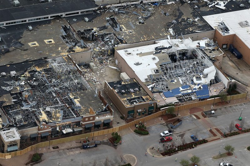 Crews clear damage Monday, March 30, 2020, at The Mall at Turtle Creek in Jonesboro after the mall took a direct hit from the EF-3 tornado that hit Jonesboro March 28. See more photos at www.arkansasonline.com/331tornado/. (Arkansas Democrat-Gazette/Thomas Metthe)