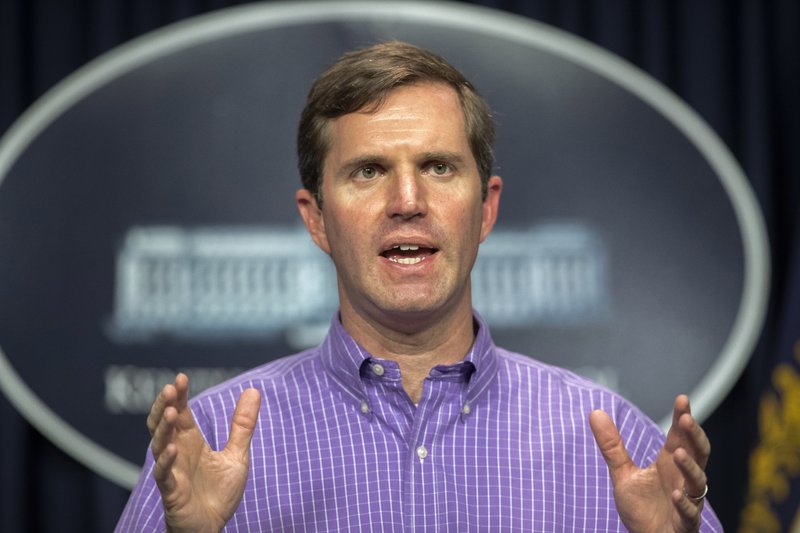 Kentucky Gov. Andy Beshear speaks during a media conference at the state Capitol in Frankfort, Ky., to provide an update on the novel coronavirus on Sunday, March 29, 2020. (Ryan C. Hermens/Lexington Herald-Leader via AP)