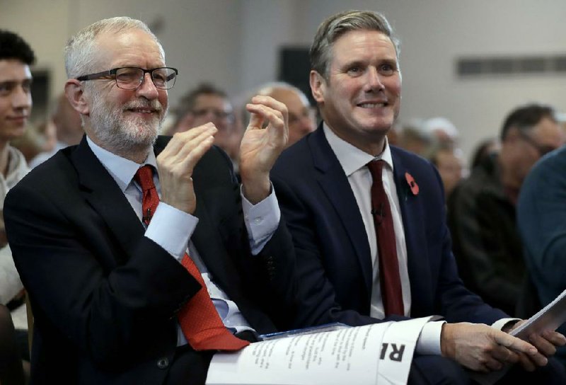 Jeremy Corbyn (left) and Keir Starmer attend a Labor Party campaign event in Harlow, England, last year.
(AP/Matt Dunham)