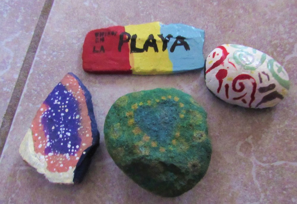 Rock on by painting smooth-sided, clean rocks with lively colors or messages; a project kids can make for entertainment during the covid-19 pandemic. (Special to the Democrat-Gazette/Kimberly Dishongh)