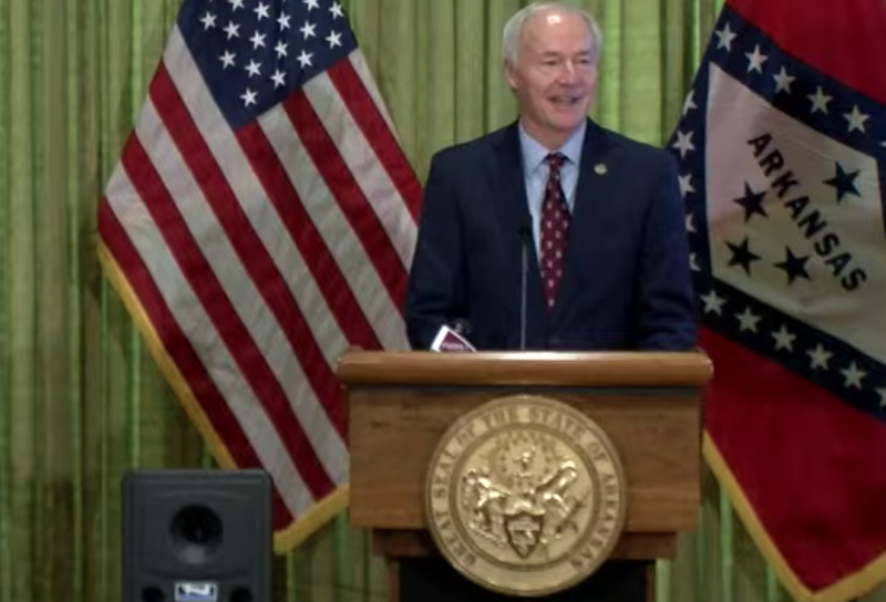 Arkansas Gov. Asa Hutchinson speaks to reporters in Little Rock on Monday in this screen grab of video provided by the governor’s office. 