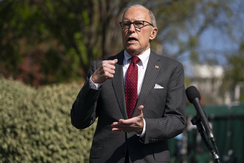 White House chief economic adviser Larry Kudlow talks to reporters at the White House, Monday, April 6, 2020, in Washington. (AP Photo/Evan Vucci)