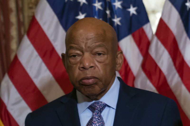 In this June 21, 2019, file photo, Rep. John Lewis, D-Ga., talks before signing the Taxpayer First Act of 2019, at the Capitol in Washington. Civil rights icon Lewis is backing Joe Biden for president, giving the prospective Democratic nominee perhaps his biggest symbolic endorsement among the many veteran black lawmakers who back his candidacy. “We need his voice,” the 80-year-old Lewis told reporters ahead of the campaign's Tuesday, April 7, 2020 announcement. (AP Photo/J. Scott Applewhite, File)