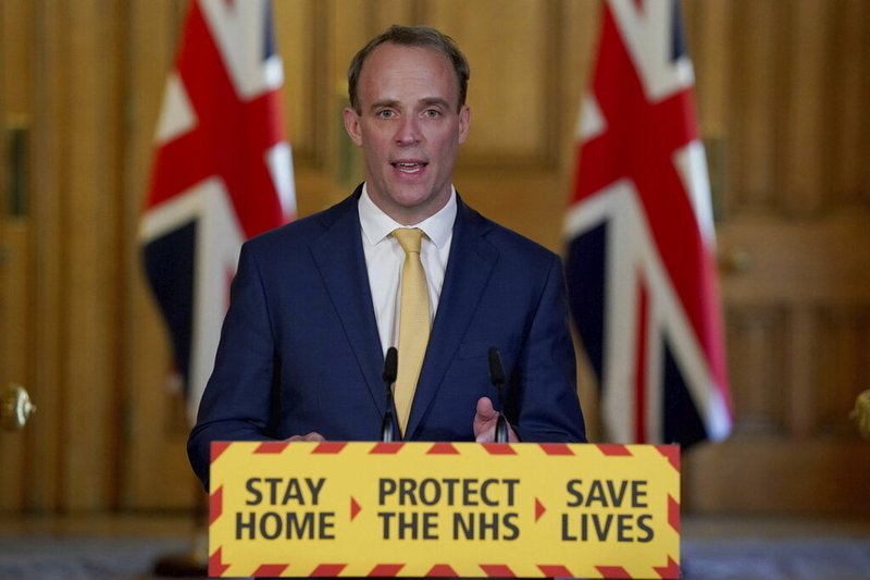 In this handout photo provided by 10 Downing Street, Britain's Foreign Secretary Dominic Raab speaks during a media briefing on coronavirus in Downing Street, London, Tuesday, April 7, 2020.

