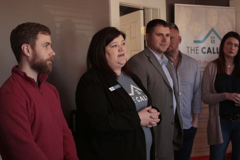 The CALL in Union County Director Karen Hicks (center) addresses attendees of February's ribbon cutting at the organization’s new Support Center. Hicks said Tuesday that all the foster families in the county have full houses and won't be able to help the influx of children entering the foster system.